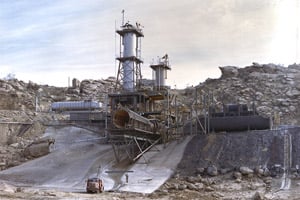 This 1963 image depicts an overall view of the vertical test stand for testing the J-2 engine at Rocketdyne's Propulsion Field Laboratory, in the Santa Susana Mountains, near Canoga Park, Calif. Boeing, which was fined for dumping a toxic stew of pollutants at this site, has won a no-bid stimulus contract to clean it up. (NASA)
