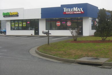 When service members ask about title loans at TitleMax, they're directed to InstaLoan, TitleMax's sister company, which provides installment loans. Outside of Fort Stewart in Hinesville, Ga., that's next door.  (Mitchell Hartman/Marketplace)