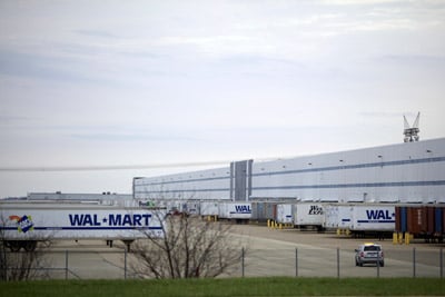 Walmart's warehouse complex southwest of Chicago is managed by Schneider Logistics. Walmart, along with many other American companies, benefits from temp labor, both for its flexibility and for the protection it provides from complaints from workers and regulators. (Sally Ryan for ProPublica)