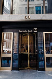 A guard stands outside the New York headquarters of Deutsche Bank  in Lower Manhattan on April 8, 2010. An internal investment fund within  Deutsche Bank bought the risky equity along with Magnetar in the hedge  fund's maiden CDO. (Dan Nguyen/ProPublica)