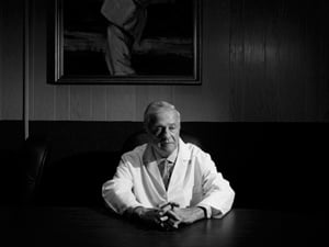 Dr. Frank Minyard in his office in New Orleans. He struggled with mixed feelings while leading an investigation into the deaths at Memorial. (Paolo Pellegrin/Magnum Photos)