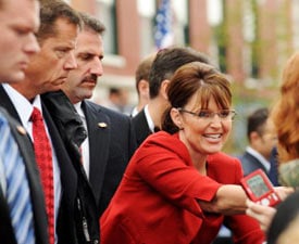 Secret Service agents keep an eye on the crowd as they provide protection for Governor Sarah Palin at a campaign event in Lebanon, Ohio on September 9, 2008.   (ROBYN BECK/AFP/Getty Images)