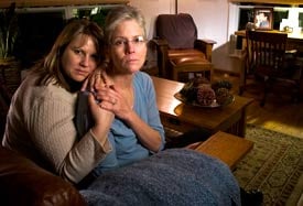 Vickie Burton, who lost her husband Steven after he was in the care of Psychiatric Solutions Inc. at Sierra Vista Hospital in Sacramento, is comforted by daughter Carrie Thomas in Camino, Calif. (Photo By: Peter DaSilva for The Los Angeles Times)