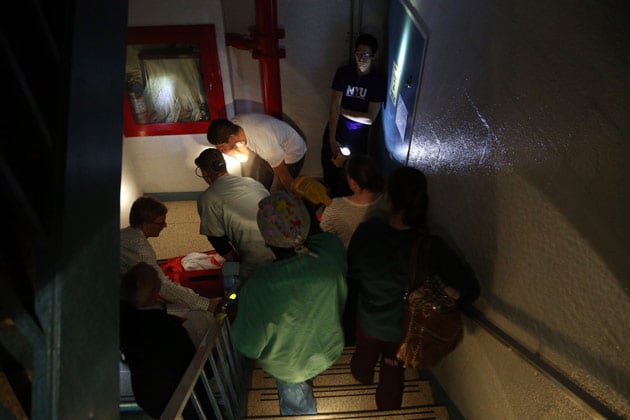 Hospital workers evacuate a patient from NYU Langone Medical Center during Hurricane Sandy on Oct. 29, in New York City. (Michael Heiman/Getty Images)
