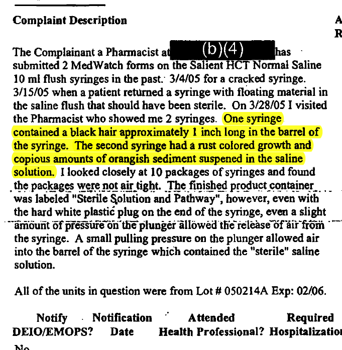 Mar. 29, 2005: A pharmacist reports 'copious amounts' of orange sediment and a hair in AM2PAT syringes.