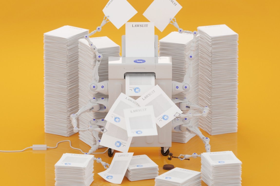 A fax machine surrounded by stacks of paper. The machine has several robot arms holding pieces of paper that say 