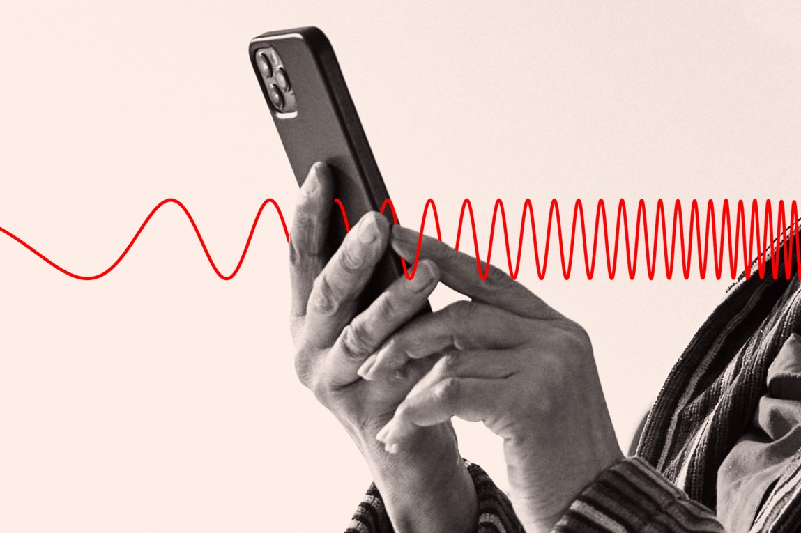 Hands hold a cellphone. An illustration of wavy red line passes through the middle of the image.