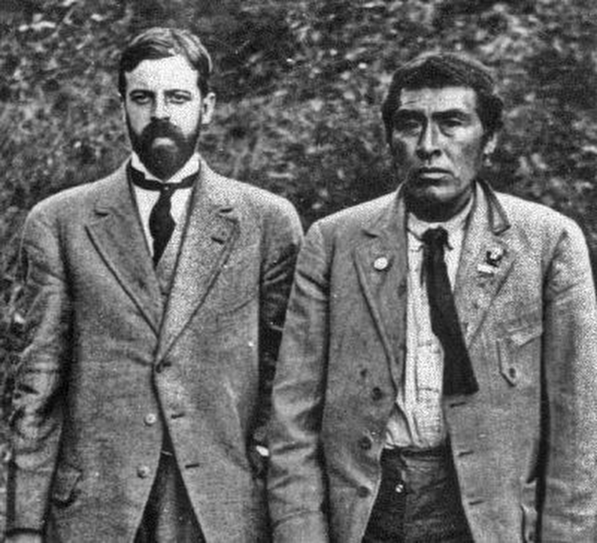 Two men in early 20th century suits