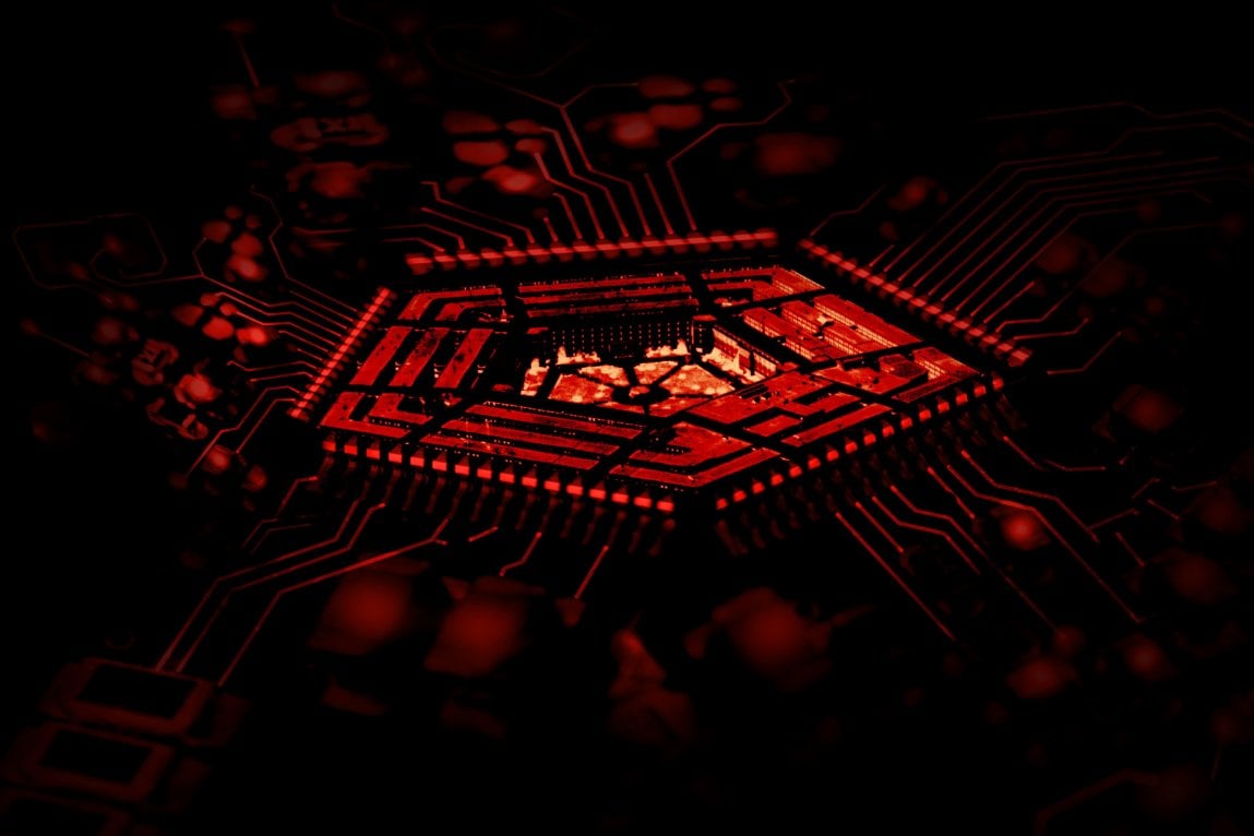 A photo illustration of the Pentagon as a computer chip on a circuit board, bathed in ominous red light.